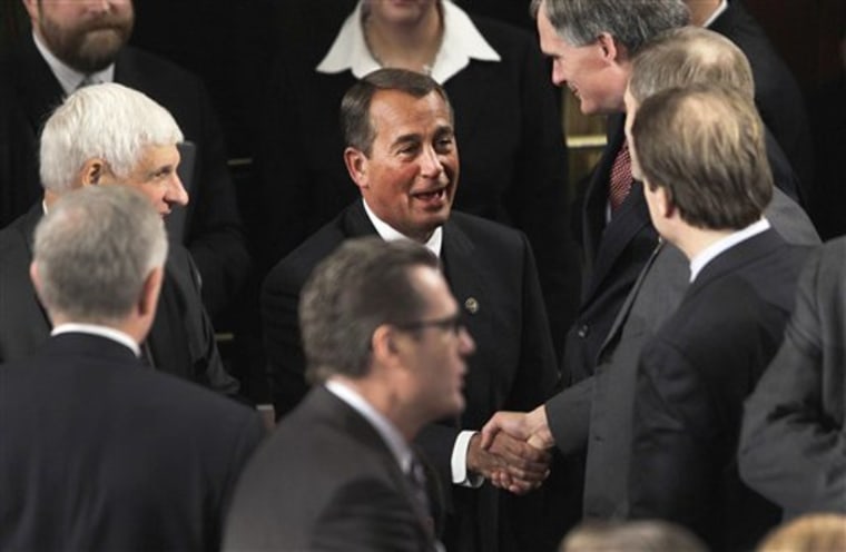 House Speaker-desigante John Boehner of Ohio greets House members during the first session of the 112th Congress, on Capitol Hill in Washington, Wednesday, Jan. 5, 2011.  (AP Photo/Charles Dharapak)